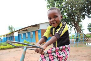 Young boy riding his bike in Lilongwe 