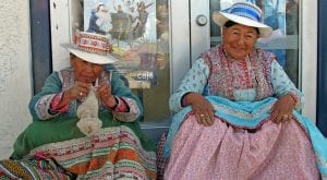 two ladies in traditional Peruvian dress