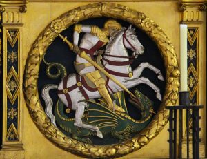 st george on his white horse fighting a dragon