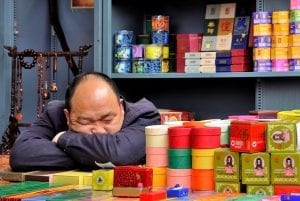 man asleep at his desk