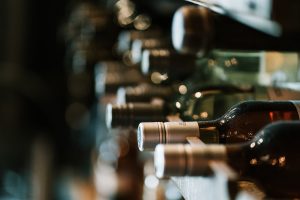 a wine rack full of different wines