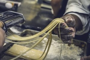 fresh spaghetti being made