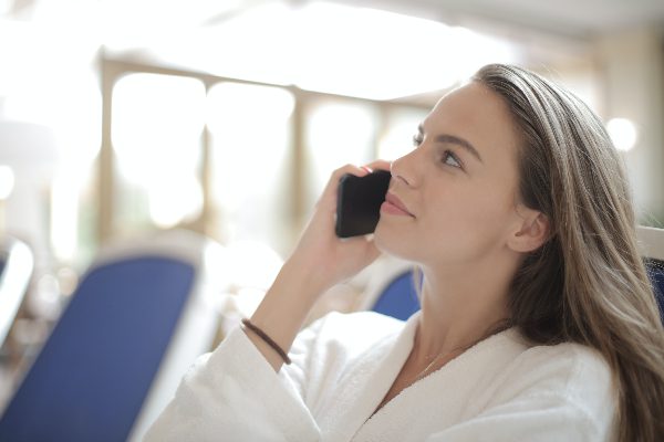 woman conversing on the phone