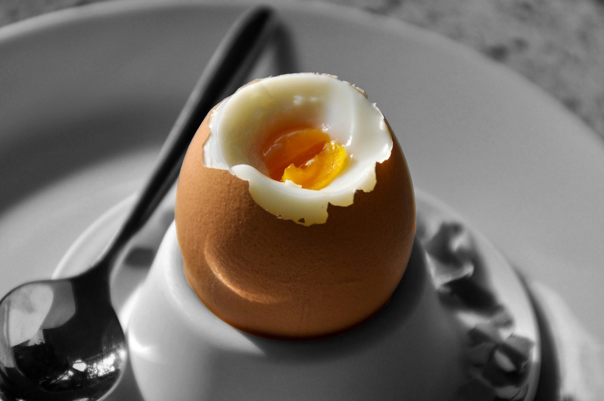 cracking in to a boiled egg for breakfast