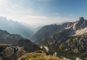 view from the top of a mountain in the summer