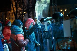 peaceful Protestors giving police flowers