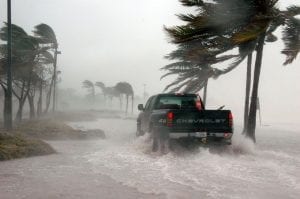 a truck driving through a hurricane