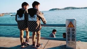 twin boys, dressed in the same clothing