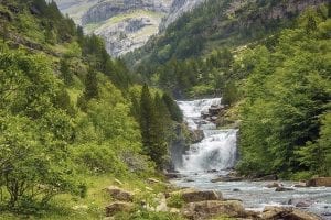 A river coming down through the Pyrenees mountains