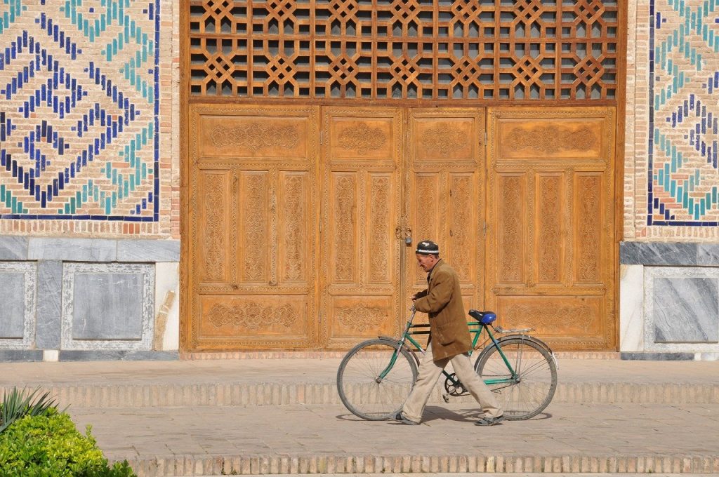 man with bike, Uzbekistan
