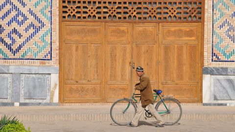 man with bike, Uzbekistan