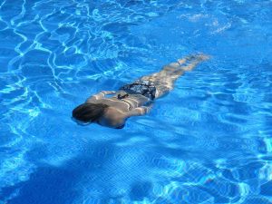Woman swimming in a pool