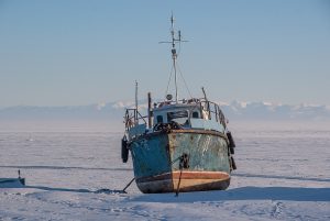 A boat frozen in to Lake Baikal, Siberia