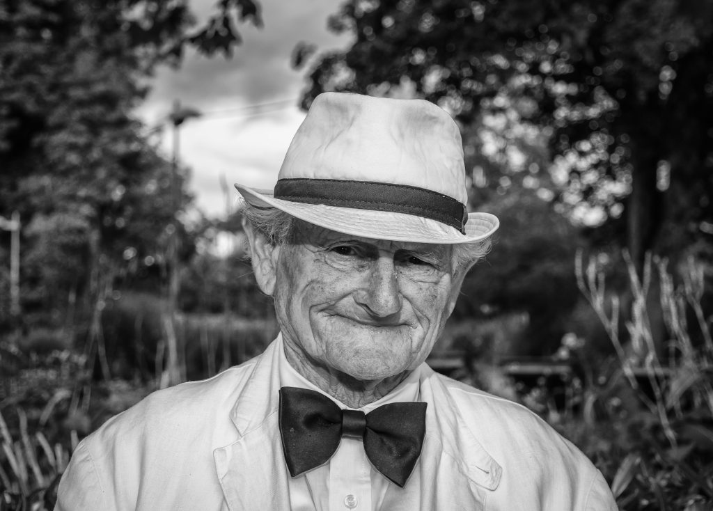 Old man wearing a fedora hat