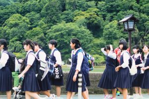 Chinese school girls walking to school