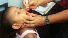 Receiving a polio vaccine